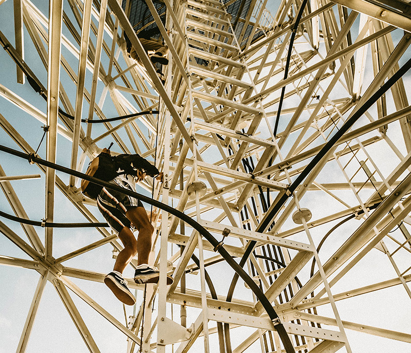 Illegally climbing a communication tower